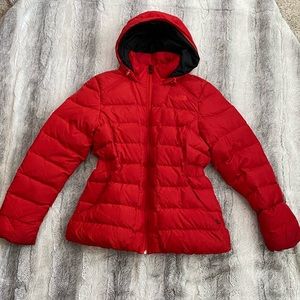 The North Face red puffer jacket